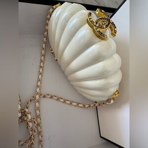 Luxurious Cream Shell Clutch with Gold Chain